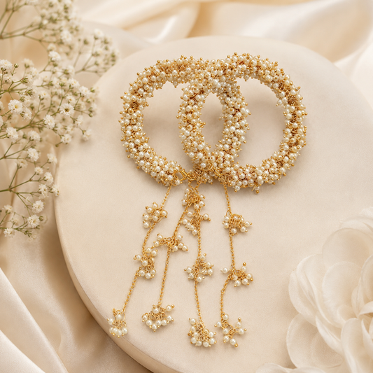Women Pearl Beaded Golden Tone Bangles with Hanging Pearl Charms